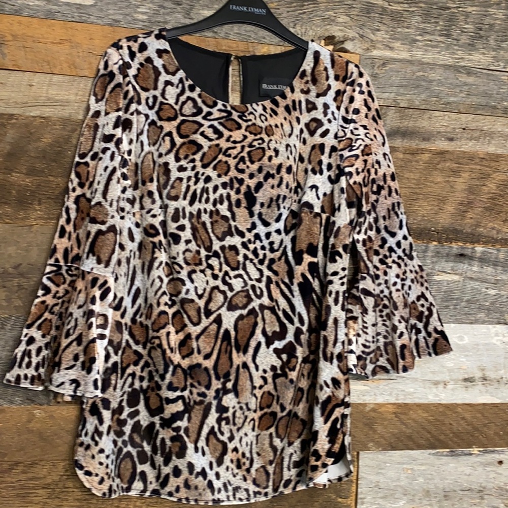 Frank Lyman knit top with built in Camisole. Beautiful bell sleeves.